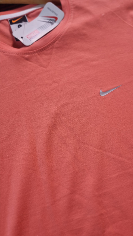 تی شرت آستین کوتاه نخی گلبهی کمرنگ برند Nike